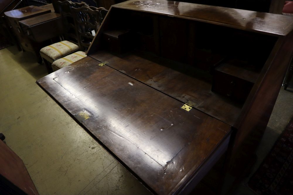 A Georgian style walnut and cross-banded bureau, width 107cm depth 54cm height 110cm